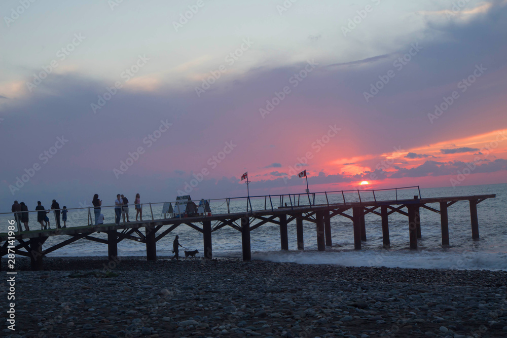 Exotic Paradise, sunset. Tourism and Vacations Concept. Resort. black sea Pier on the beach Batumi