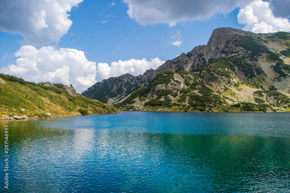 Path between Bezbog lake and hut and the Popovo lake in Pirin national park, near Bansko, Bulgaria