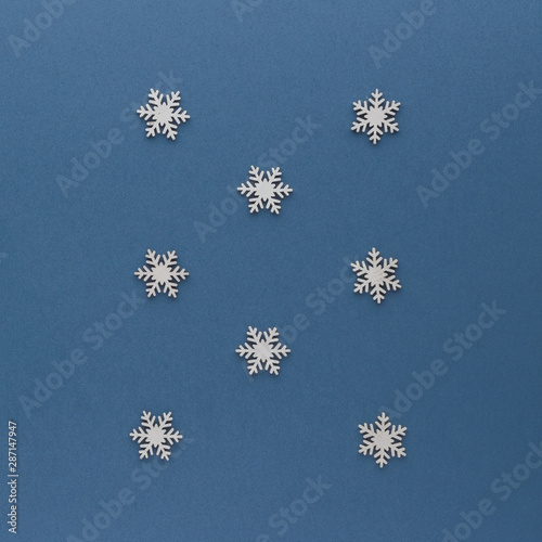 Christmas composition. Snowflake top view background with copy space for your text. Flat lay.