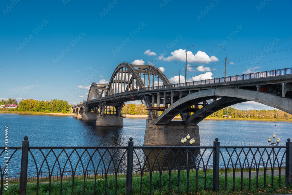 Naklejka premium Bridge across the Volga river in town of Rybinsk, Russia