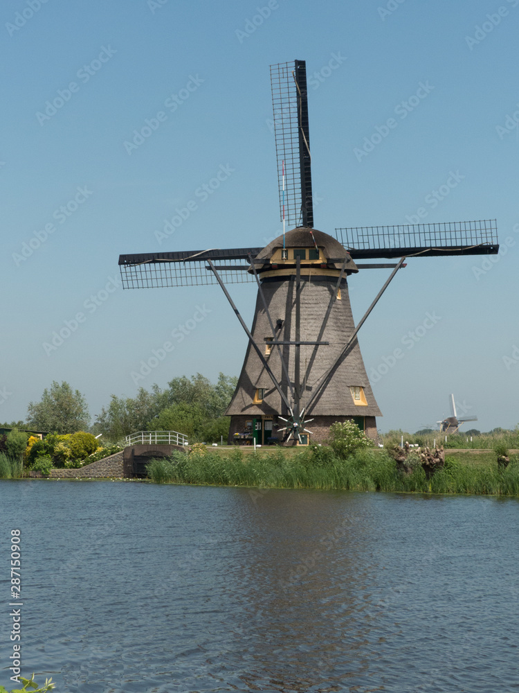 Windmill at the UNESCO World Heritage Site of Kinderdijk, near Rotterdam, Netherlands