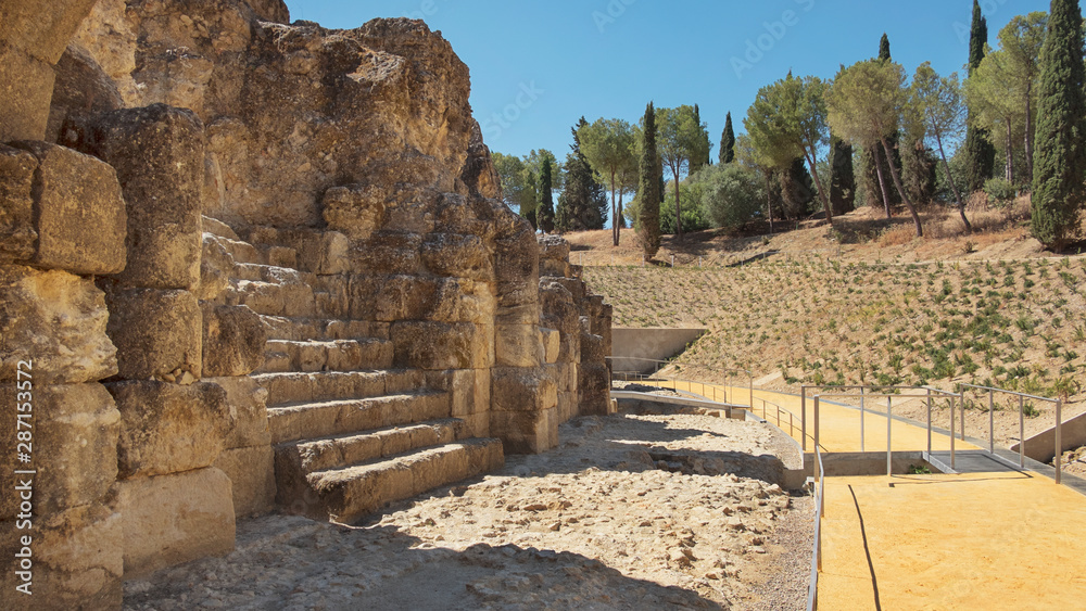 City ruins, land, walls and amphitheater, part of archaeological ensemble of Italica, city with a strategic role in the Roman Empire, birthplace of Emperors Trajan and Hadrian, in Santiponce, Seville,