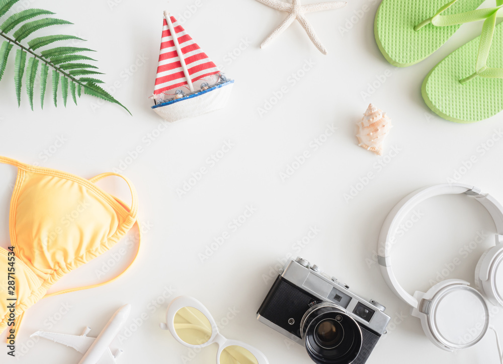 top view travel concept with retro camera and Outfit of traveler on white wooden background, Tourist essentials, vintage tone effect top view travel concept with retro camera and Outfit of traveler on white wooden background, Tourist essentials, vintage tone effect