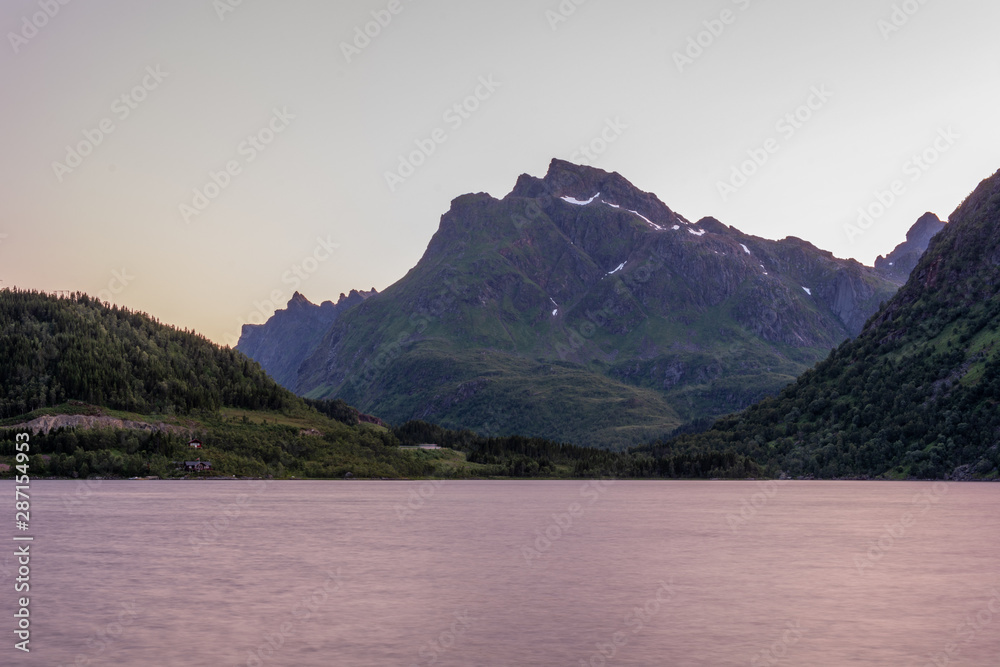 It`s a white night on the Lofoten Islands in Norway.    Tranquil views of the Innerfjorden. The photo was taken with a long exposure.