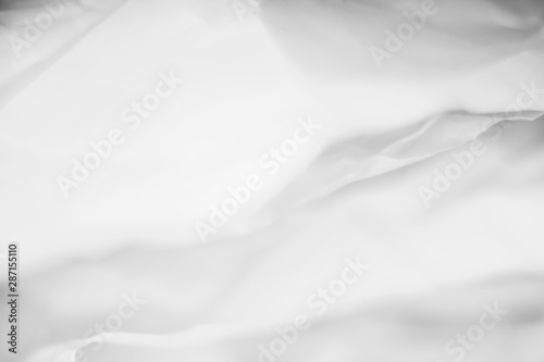 White paper layers with dark shades. Crumpled effect. Abstract art background. Empty space.