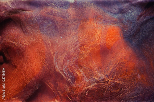 Smoke leak. Enchanted energy. Purple orange glitter abstract steam. Creative art background.