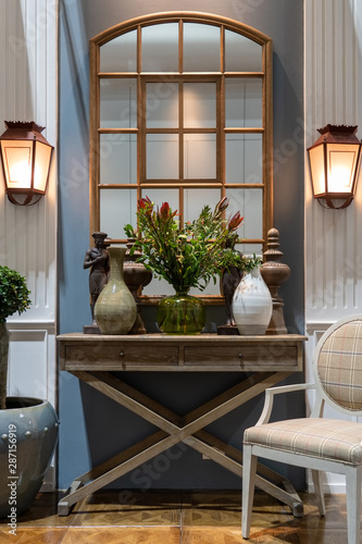 flowers and vintage ceramic jars