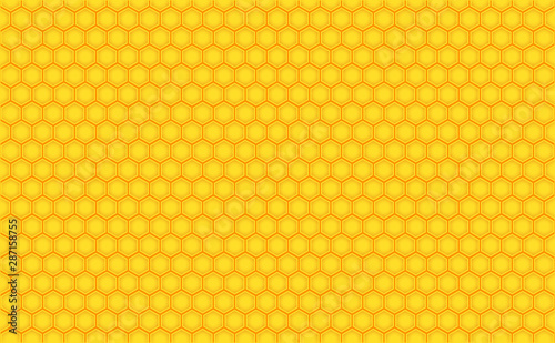 Abstract honeycomb repeated pattern in golden yellow. Geometric background or seamless pattern inspiration of hexagons, prismatic cells similar to beeswax frames or hive frames built by honey bees.
