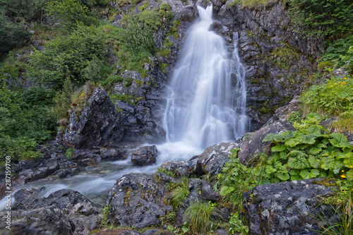 The well-known waterfall of L Oursiere in Chamrousse massif  near grenoble