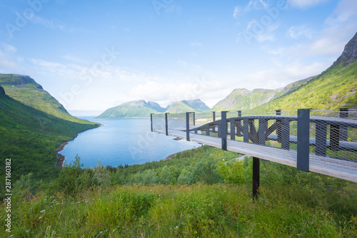 Bergsbotn Cantilevered Viewpoint Bridge over Bergsfjord with Blue Sky, Norwegian Scenic Route, Senja Island, Norway