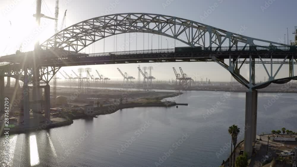 Ascending Aerial: Bridge in Port of Los Angeles in San Pedro on Sunny Evening - San Pedro, California