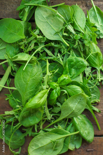 Healthy salad, leaves mix salad (mix micro greens, juicy snack, tomato). food background - Image