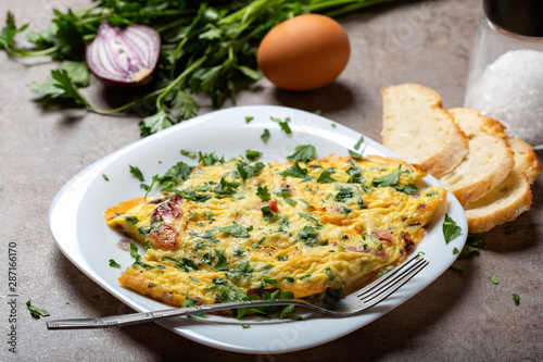 Fresh omelette with chopped parsley