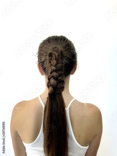 Hairstyle on long hair, braiding a fishtail