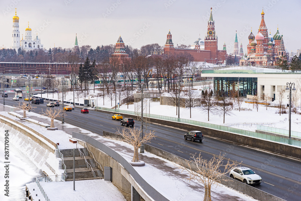 Obraz premium Moscow. Russia. Zaryadye Park in the winter.The road to the Kremlin. Winter highway in Moscow. Highway near red square.Panorama of Zaryadye Park in the snow. Road overlooking St. Basil's Cathedral.