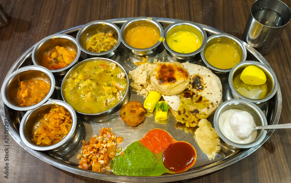 Gujarati Thali a vegetarian food dish in steel plate Stock Photo