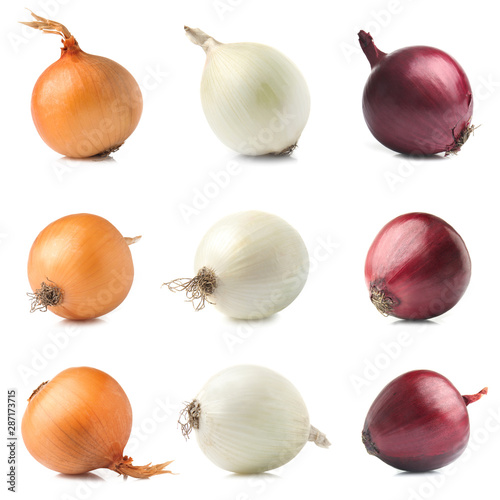 Set with different raw onion on white background