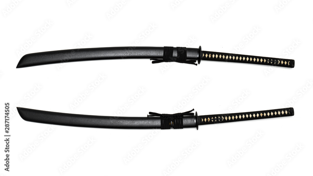 2 Sides of Japanese sword black cord with black scabbard isolated in white background. 2 Sides of Japanese sword black cord with black scabbard isolated in white background.