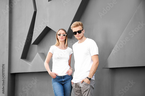 Man and woman in stylish t-...