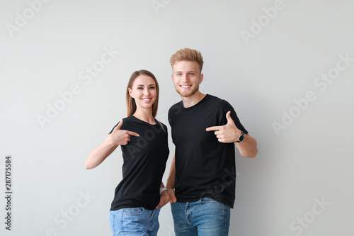 Couple in stylish t-shirts ...