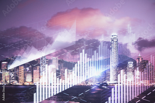Double exposure of forex chart drawings over cityscape background. Concept of success. © peshkova