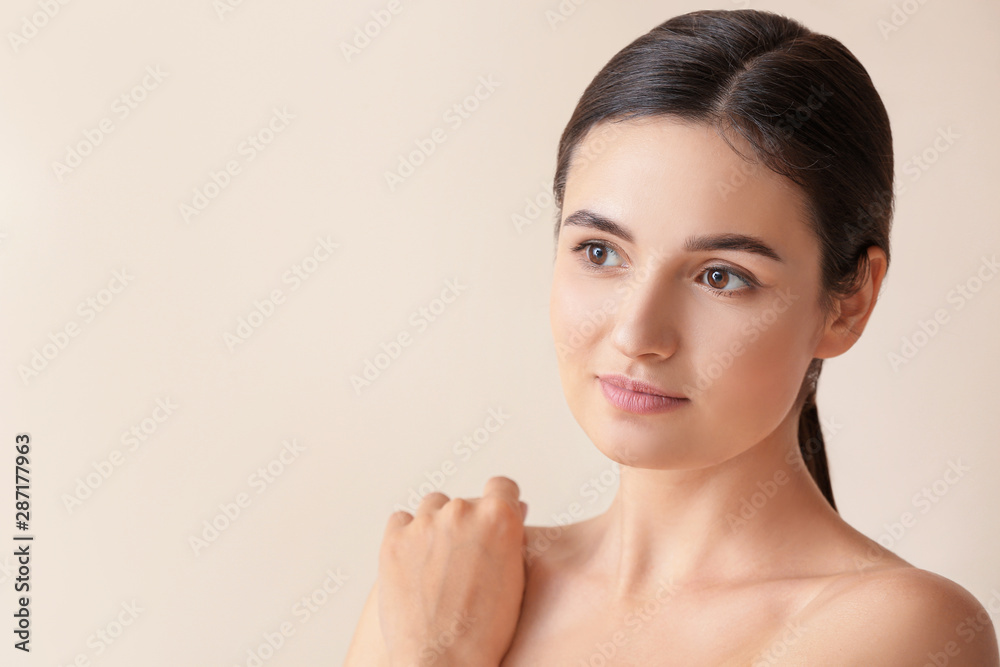 Young woman with beautiful eyebrows on light background Young woman with beautiful eyebrows on light background