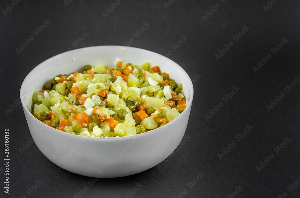 Russian salad Olivier with potato carrot green peas Russian salad Olivier with potato carrot green peas