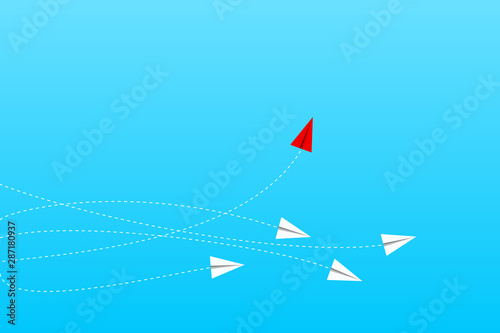 Think differently concept. Red airplane changing direction. New idea, change, trend, courage, creative solution, innovation and unique way concept.