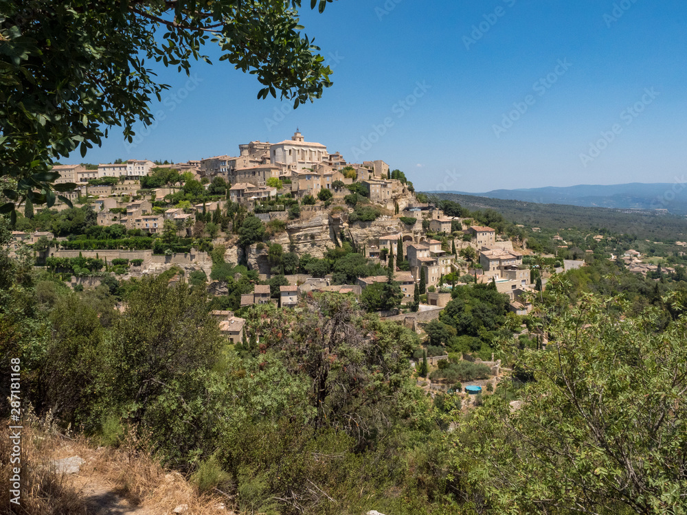 France, july 2019: View of Gordes, a small medieval town in Provence. A view of the ledges of the roof of this beautiful village and landscape.