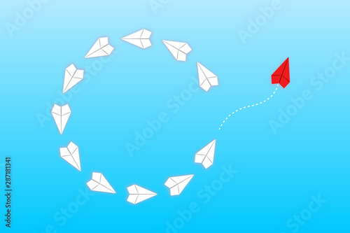 Think differently concept. Red airplane exit formation flying. New idea, change, trend, courage, creative solution, innovation and unique way concept.