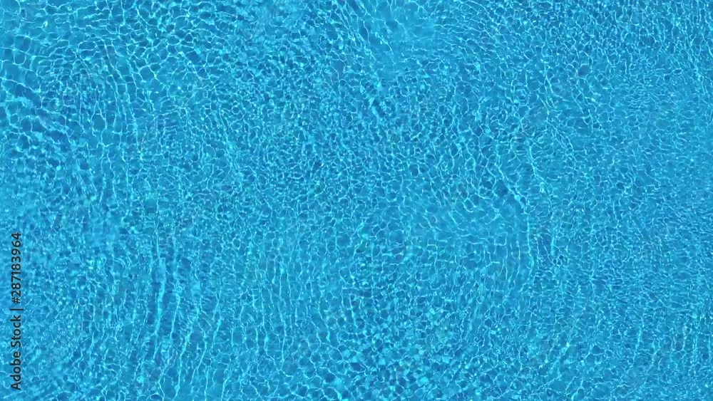 Top view from a drone over the surface of the pool Top view from a drone over the surface of the pool