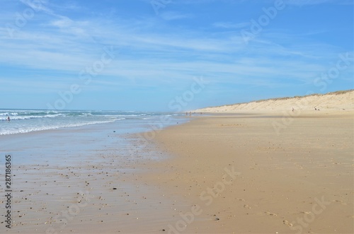 Nice blue and coloured sand snapshot of a french atlantic beach