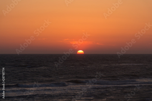 Fototapeta Naklejka Na Ścianę i Meble -  Twilight before the sun sets over Tyrrhenian sea. Amazing sunset.