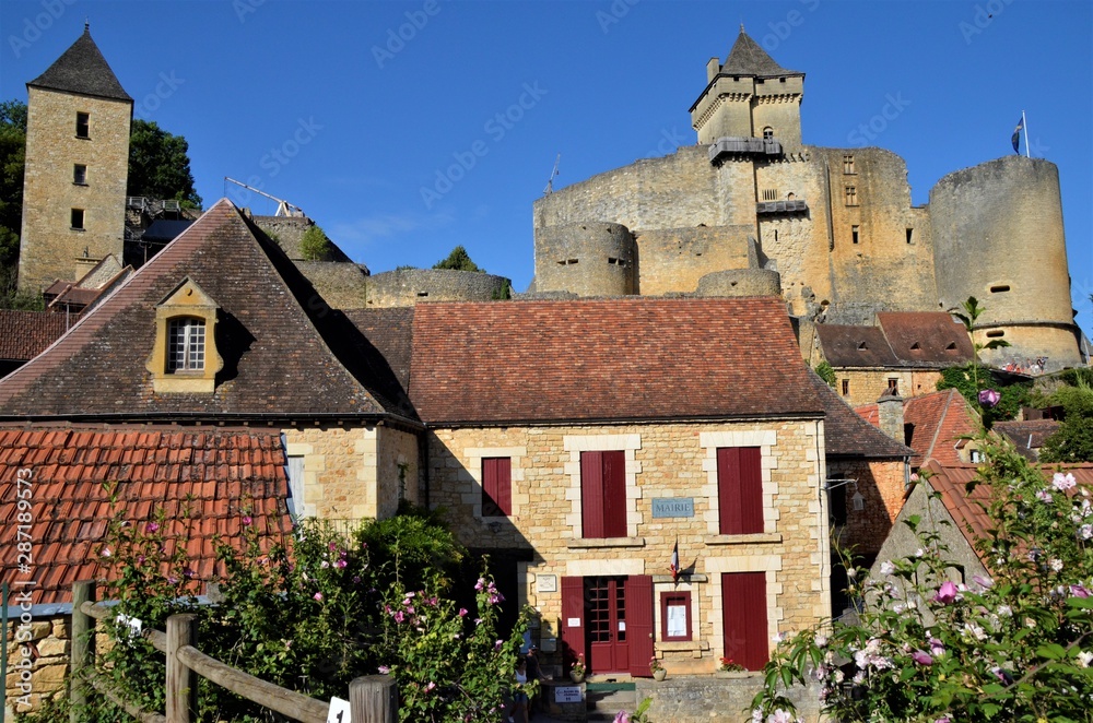 View of Castelnaud fortress and town hall