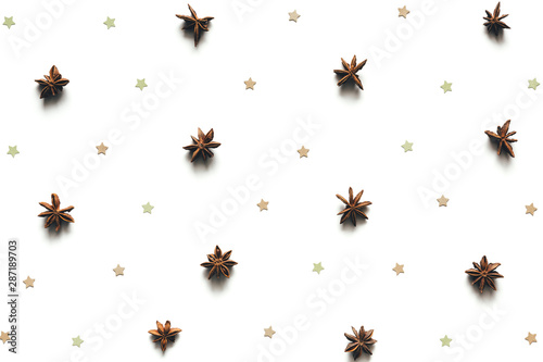 Christmas Pattern With Anise Stars On White Background © Metamorphosa
