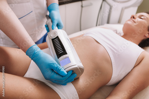 woman receives a spa treatment photo