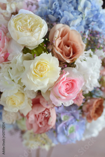 the most beautiful flowers, magnificent bouquets of flowers on the leg in the interior of the restaurant for a festive floristry store or wedding salon for the bride or groom, a bridal bouquet, butane