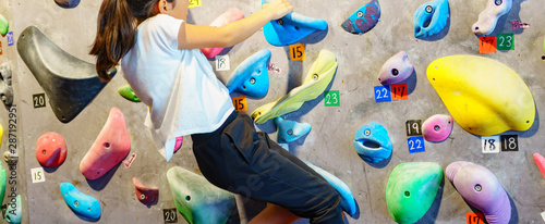 Young girl and landscape of bouldering climbing studio in Japan