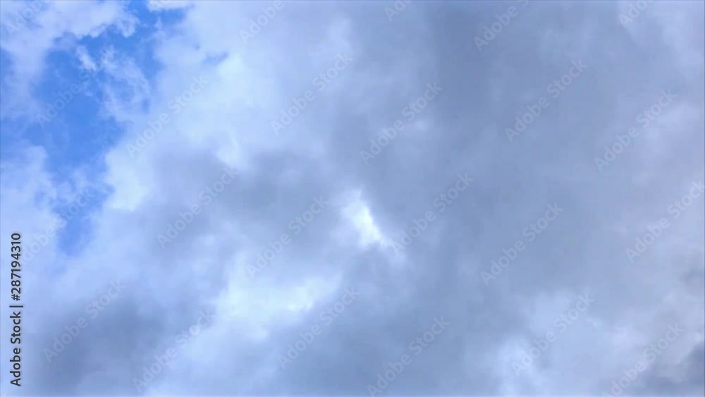 Cloudy sky timelapse. Clouds fast moving on the blue sky Cloudy sky timelapse. Clouds fast moving on the blue sky