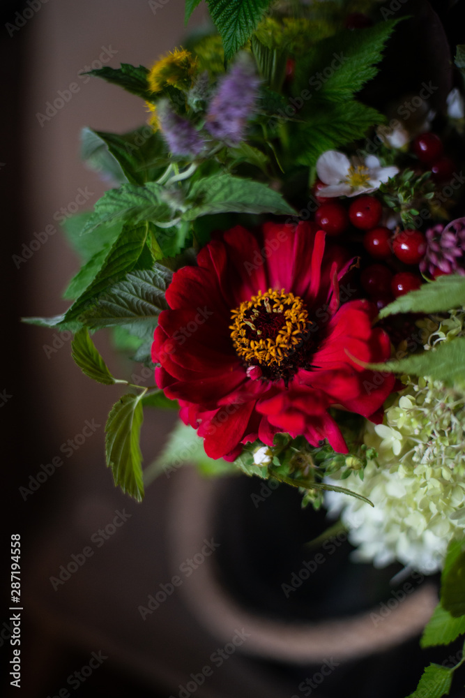 Obraz premium the most beautiful flowers, magnificent bouquets of flowers on the leg in the interior of the restaurant for a festive floristry store or wedding salon for the bride or groom, a bridal bouquet, butane