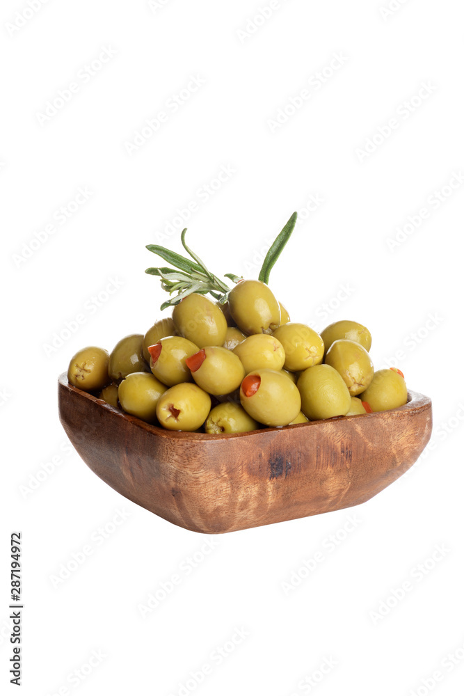 wood bowl of pimento green olives with rosemary isolated wood bowl of pimento green olives with rosemary isolated
