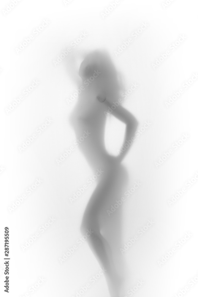 Beautiful and sexy nude woman stands and poses behind a white textile  curtain. Perfect body shape silhouette can be seen. foto de Stock | Adobe  Stock