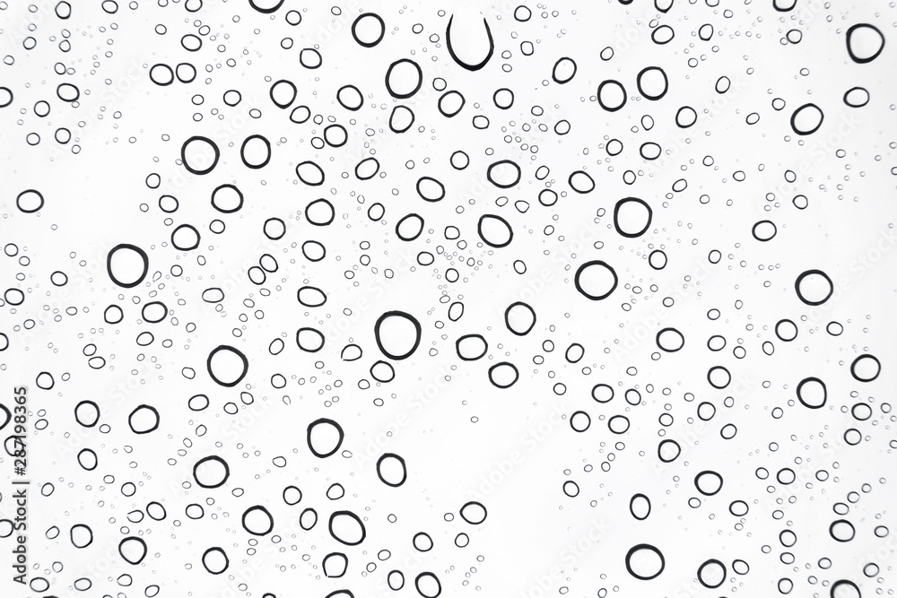 Rain drops on glasses surface background./Natural pattern of raindrops on white background. Rain drops on glasses surface background./Natural pattern of raindrops on white background.
