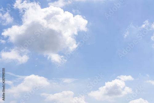 blue sky with cloud closeup Blue sky with clouds background blue sky background with tiny clouds Sky daylight. Natural sky composition. Element of design. © NOKFreelance