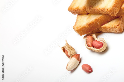 Peanut butter sandwiches or toasts on white background