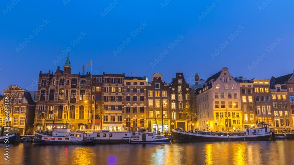 Amsterdam Netherlands time lapse 4K, city skyline day to night timelapse at canal waterfront Amsterdam Netherlands time lapse 4K, city skyline day to night timelapse at canal waterfront