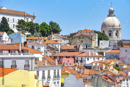 Lisbon, Portugal - July 23, 2019: Summertime views across the rooftops of the Alfama district