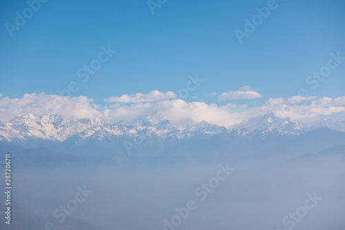 Himalaya mountains on clouds