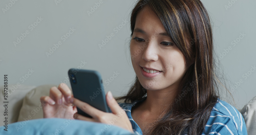 Woman use of mobile phone shop online Woman use of mobile phone shop online