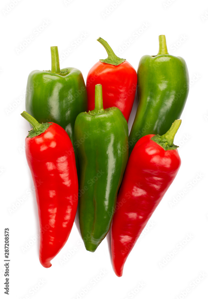 Red and green peppers isolated on white background Red and green peppers isolated on white background